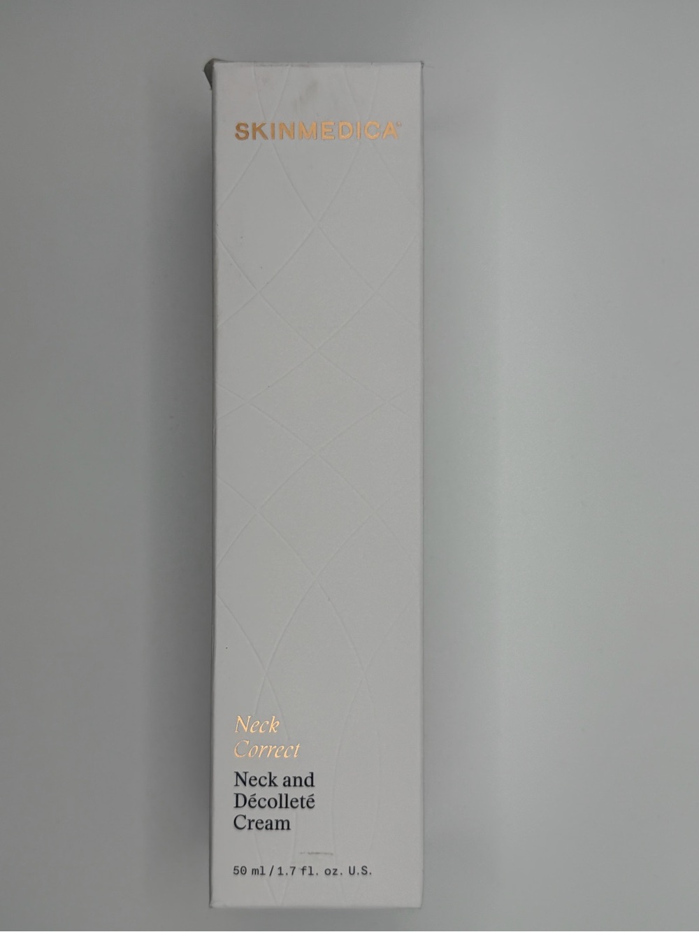 SkinMedica Neck Correct Neck and Décolleté Treatment - White with Gold Text